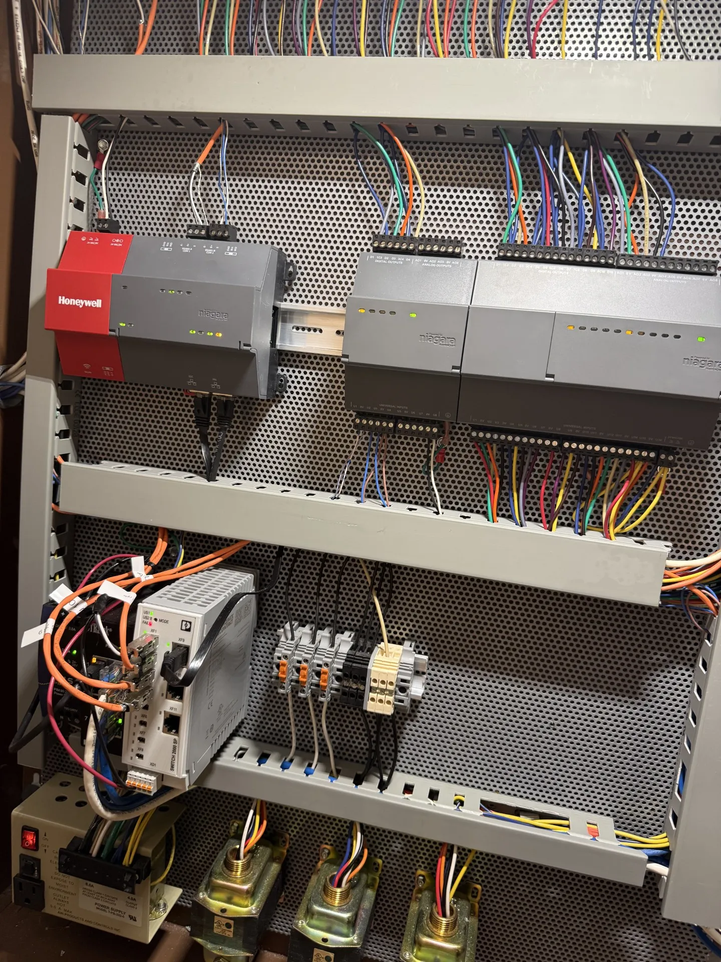 Main control panel after conversion, showing a Niagara JACE and a Phoenix Contact managed single-pair Ethernet switch