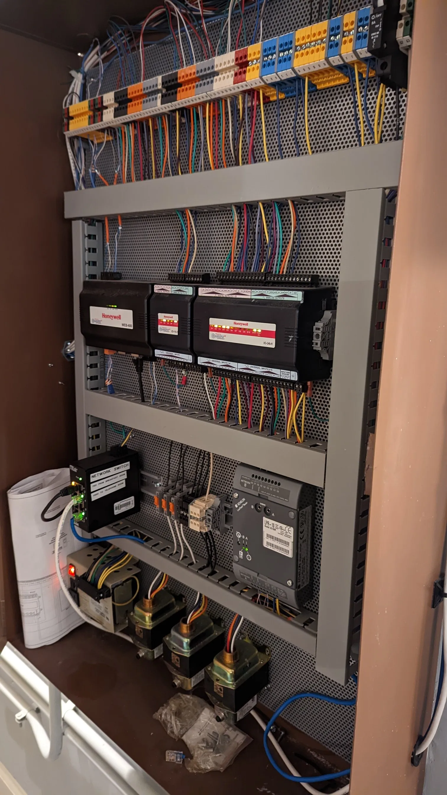 Main control panel before conversion, showing a WEB-600 JACE and an Echelon LPR-10 LonWorks router